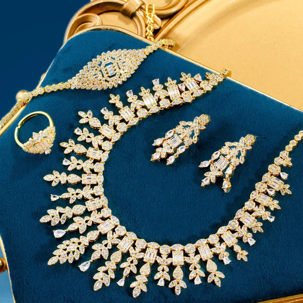 ThreeGraces 4PCS Sparkling Cubic Zirconia Gold.