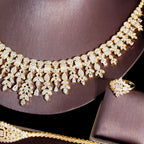 ThreeGraces 4PCS Sparkling Cubic Zirconia Gold.