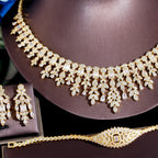 ThreeGraces 4PCS Sparkling Cubic Zirconia Gold.