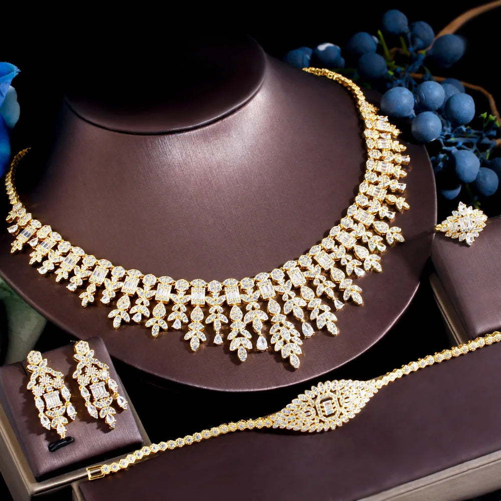 ThreeGraces 4PCS Sparkling Cubic Zirconia Gold.
