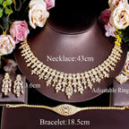 ThreeGraces 4PCS Sparkling Cubic Zirconia Gold.