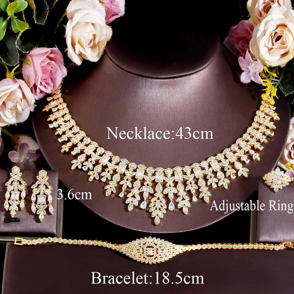 ThreeGraces 4PCS Sparkling Cubic Zirconia Gold.