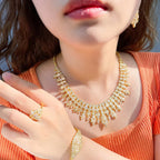 ThreeGraces 4PCS Sparkling Cubic Zirconia Gold.