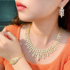 ThreeGraces 4PCS Sparkling Cubic Zirconia Gold.