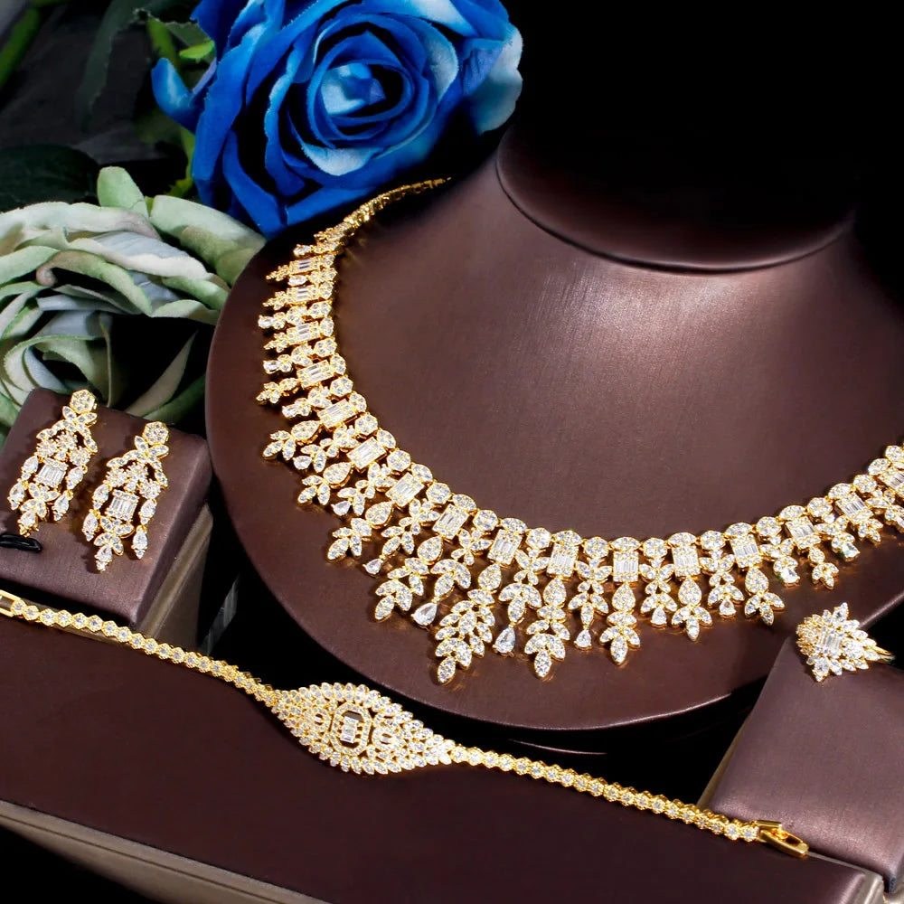 ThreeGraces 4PCS Sparkling Cubic Zirconia Gold.
