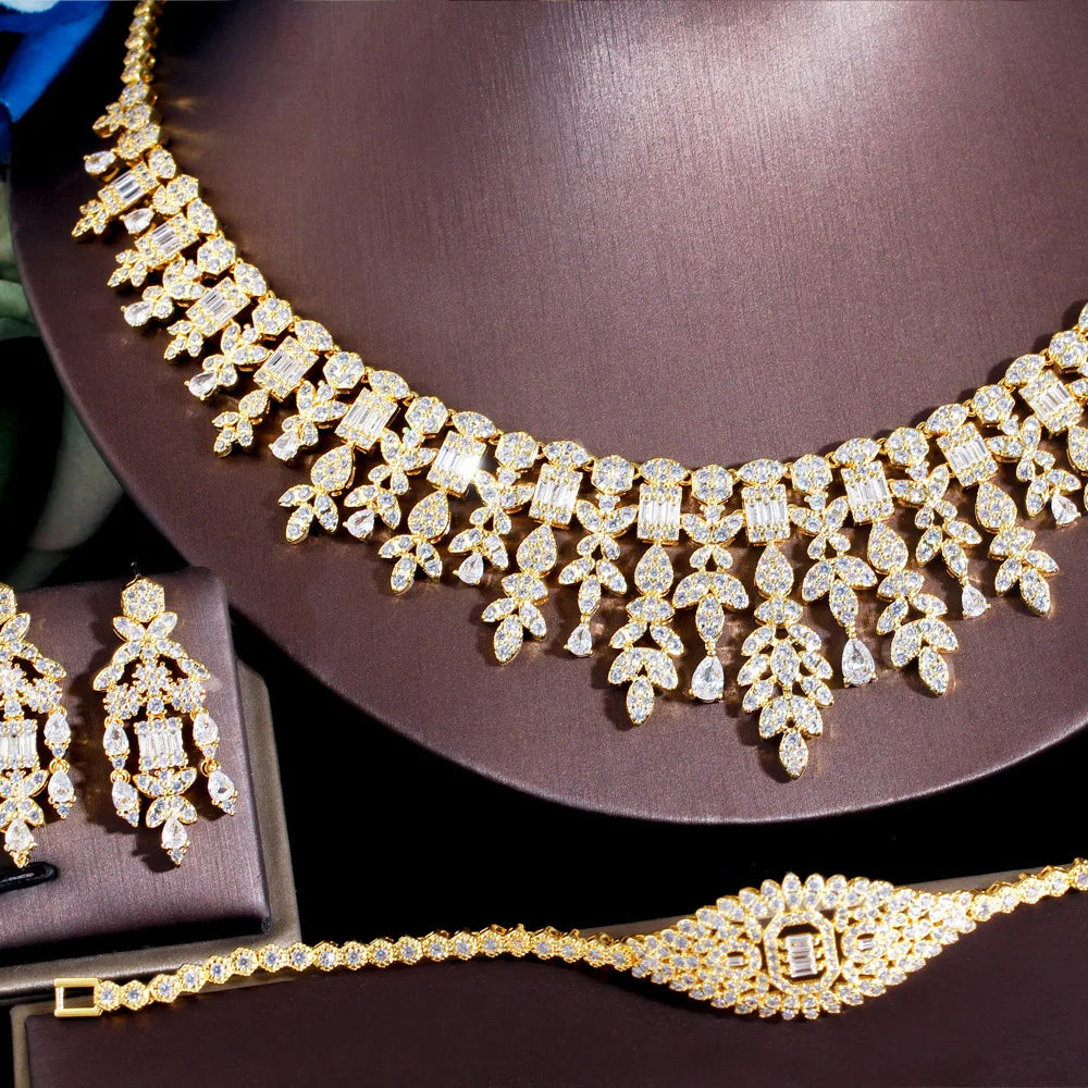 ThreeGraces 4PCS Sparkling Cubic Zirconia Gold.