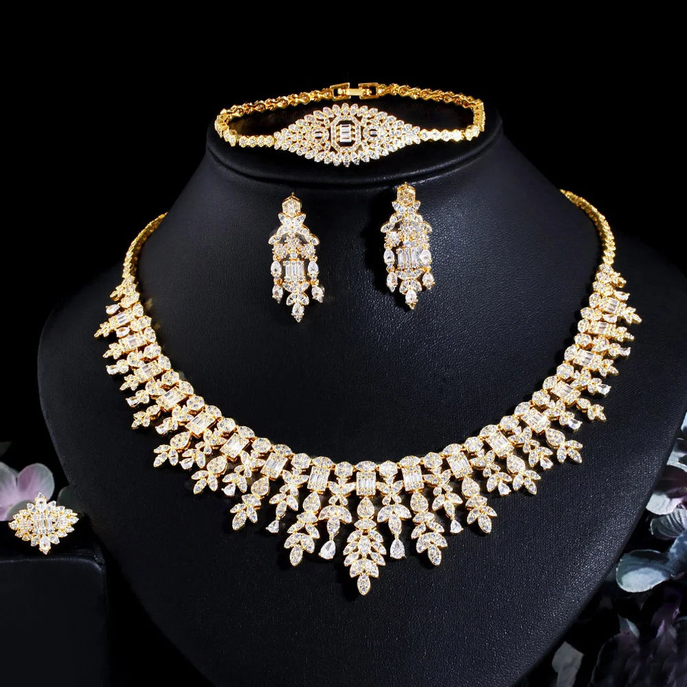 ThreeGraces 4PCS Sparkling Cubic Zirconia Gold.