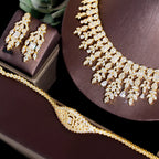 ThreeGraces 4PCS Sparkling Cubic Zirconia Gold.